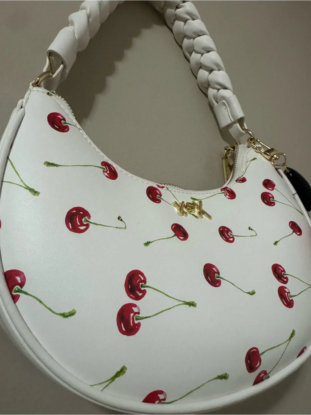 XOXO White Cherry-Print Shoulder Bag with Red Pom Charm